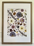 Windflower pressed flower artwork in a timber frame